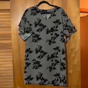 Black and white ruffle sleeve dress